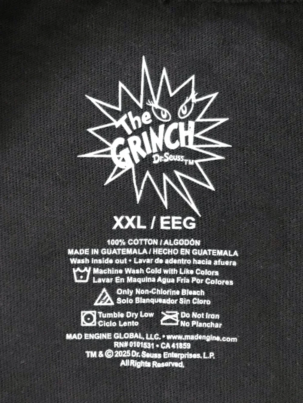 MAD Engine Black Tee with‎ Green Grinch Graphic and Yellow Eyes